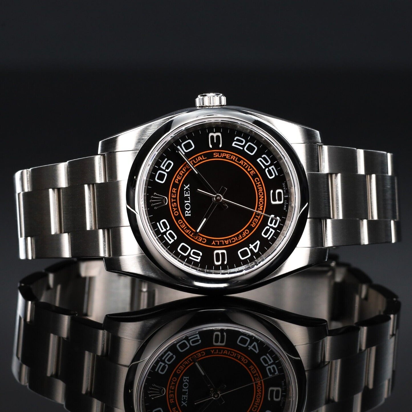 Rolex Black Orange Dial with Oyster Bracelet with Silver Bezel-116000