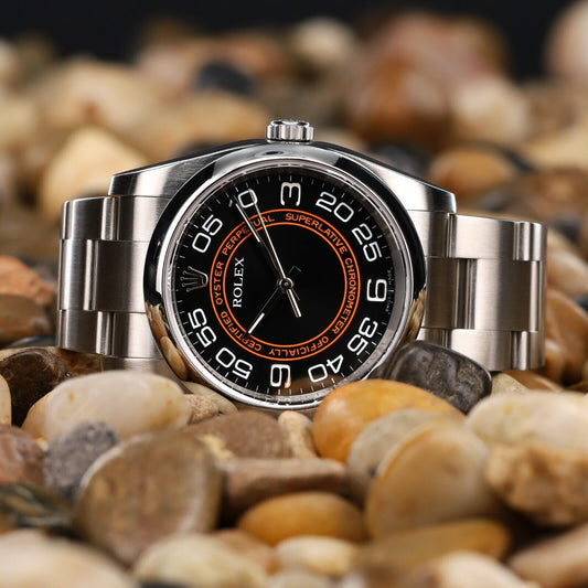 Rolex Black Orange Dial with Oyster Bracelet with Silver Bezel-116000